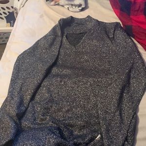 It’s a dress. It’s a medium and glittery. It’s soft and not hard to wear